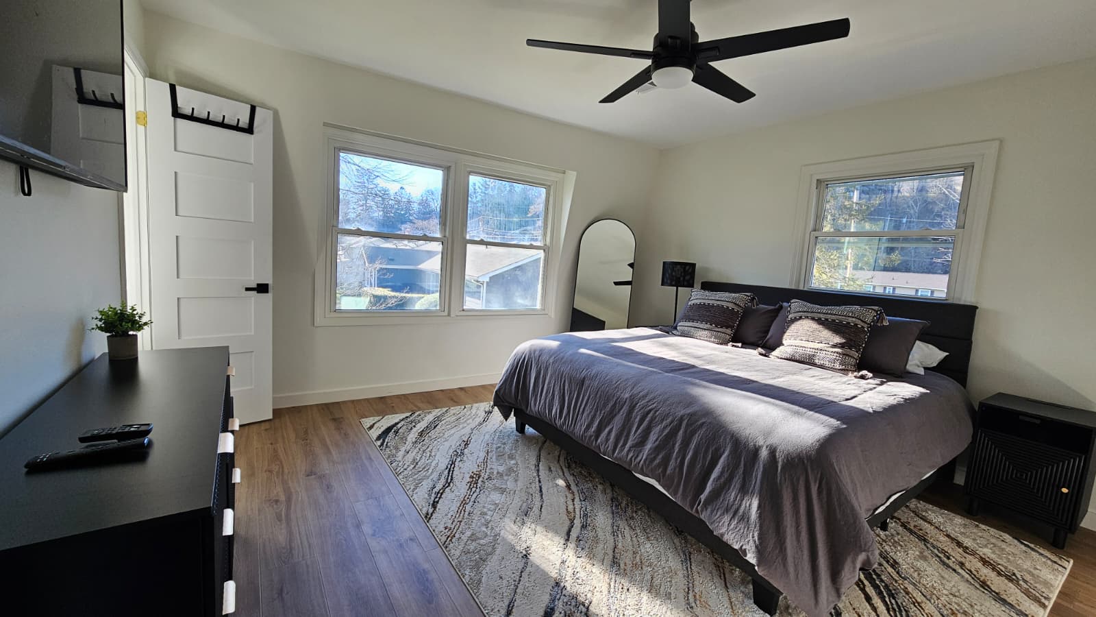 Master bedroom with king bed and upscale linens